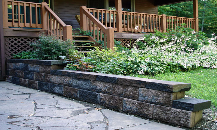 custom_stone_patio_installation_masonry_slump_stone_retaining_walls