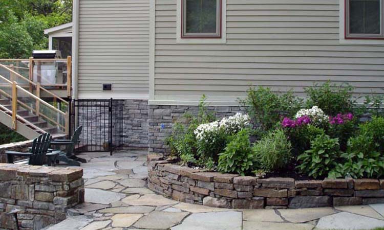 cultured_stone_veneer_foundation_rock_planter_walls_stone_walkways