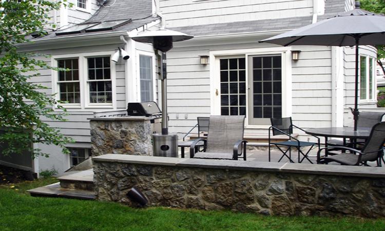 masonry_stone_patio_installation_outdoor_space_rock_privacy_walls